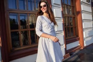 cheerful-elegant-young-brunette-lady-wearing-sungl-4YWDWCB-min-1_3_11zon-min.jpg